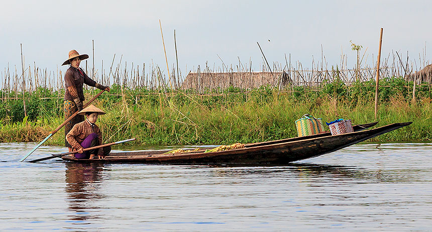 women in canoes