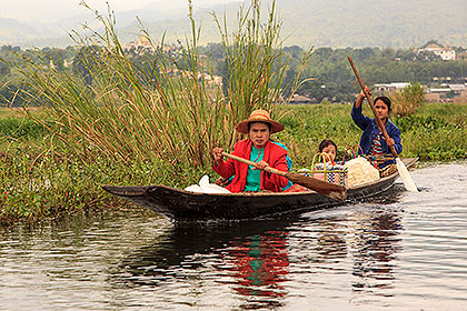 women in canoe