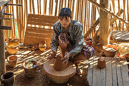 woman with potting wheel