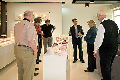 Group looking at china wares