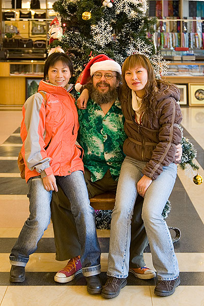 Cindy, Ping and Dr. Ray as Santa Claus