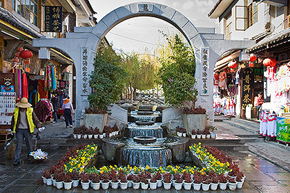 Arch, stream and flowers