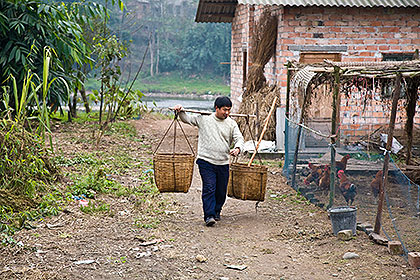 Man carrying baskets