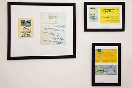 framed documents on wall