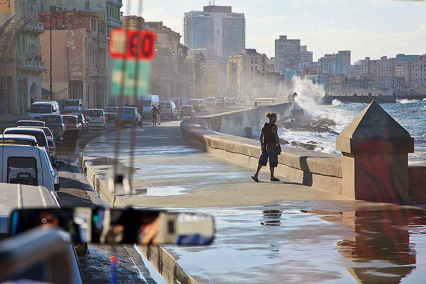 Malecon, traffic, waves crashing onto seawall