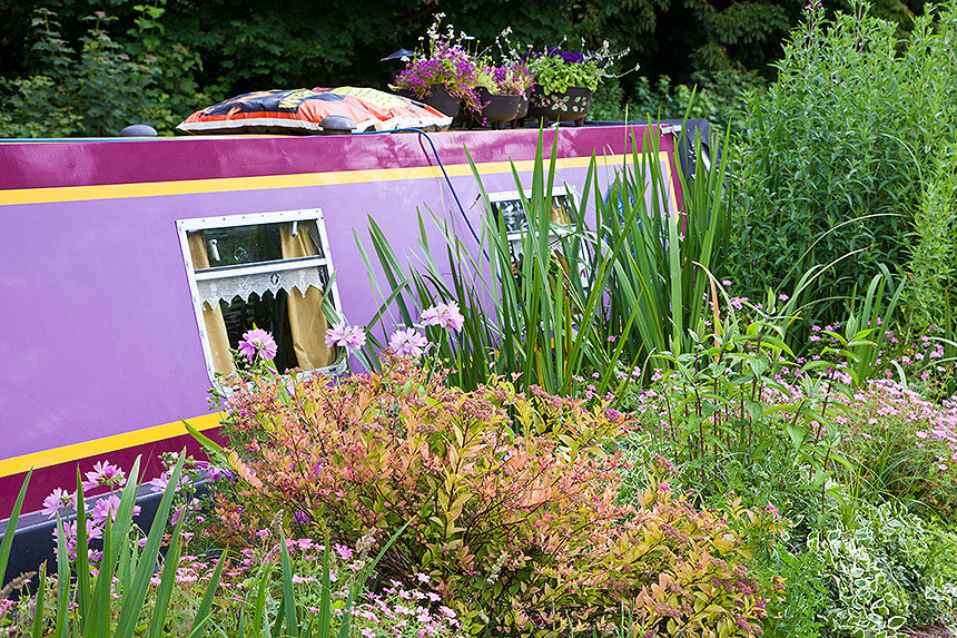 canal boat with flower garden