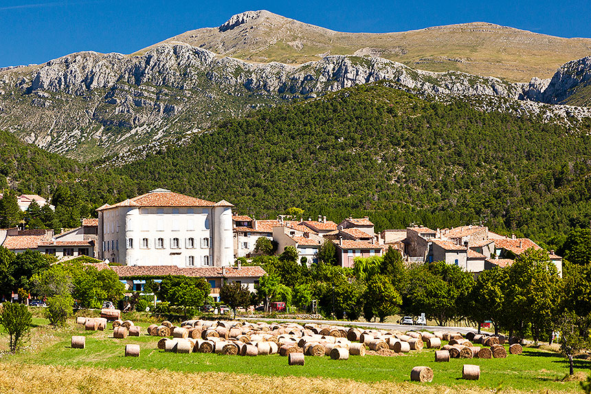 Hay bales and village